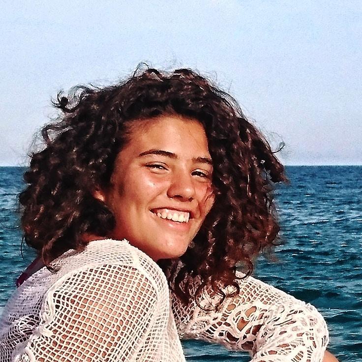 Portrait of Mira Chen, group coordinator and fusion cooking specialist